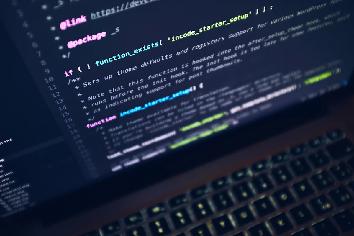 A laptop with code, representing offline-first mobile architecture