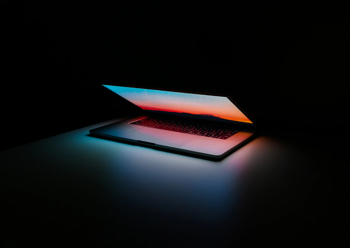 A laptop workspace, representing onboarding and activation design